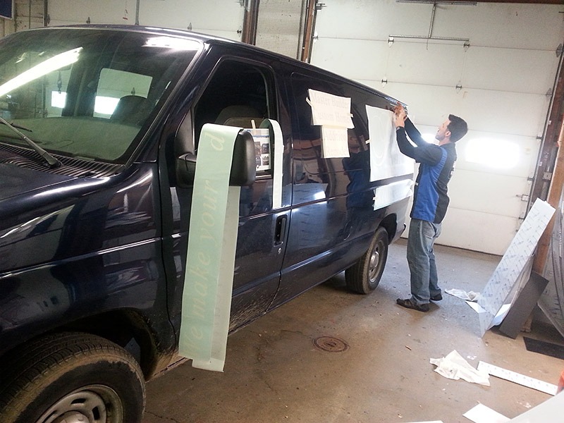 applying-vinyl-to-van